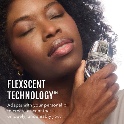 No Makeup Makeup – Woman holding a fragrance bottle with 'FlexScent Technology' text