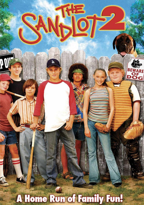 The Sandlot 2 DVD cover with kids in baseball gear and a dog behind a fence