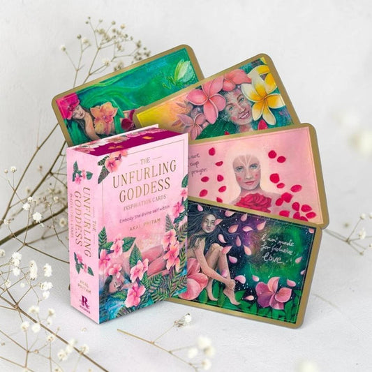 Set of 'The Unfurling Goddess' oracle cards with a box on a light background