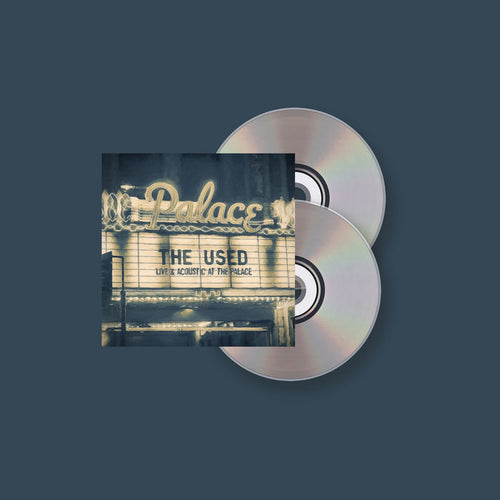 Album cover for The Used’s Live and Acoustic at the Palace shows a vintage theater marquee reading Palace and The Used, with two CDs on a dark blue background, reflecting the bands acoustic performance. Brand: The Used.