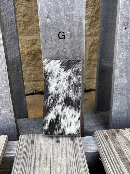 This cowhide leather tall wallet from Top Notch Accessories features 12 card slots and two bill pockets. Front View G