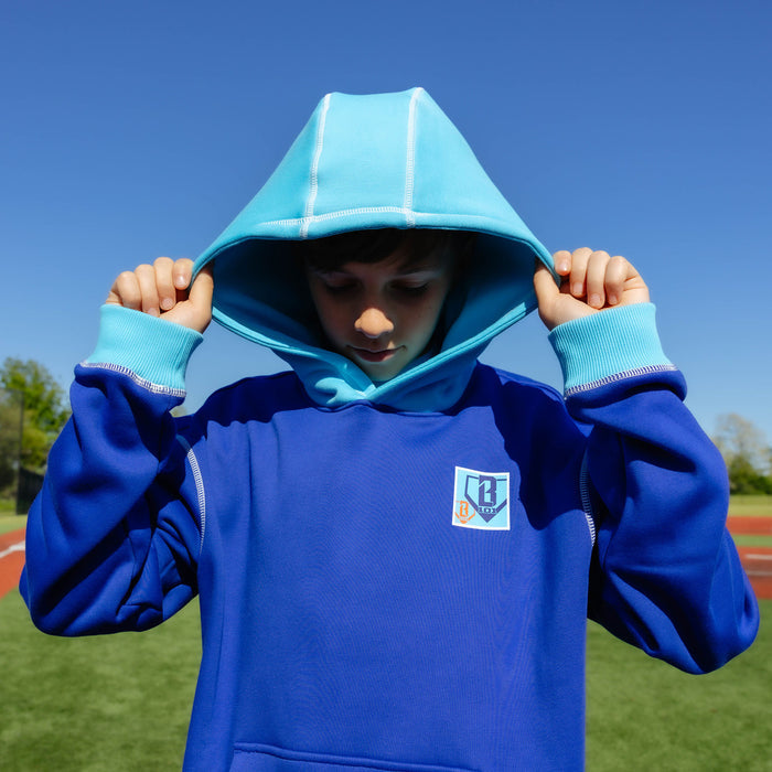 Youth model wearing navy youth hoodie with "Trash Talk Youth" design