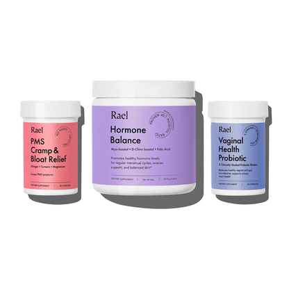 Three supplement jars labeled PMS Cramp & Bloat Relief, Hormone Balance, and Vaginal Health Probiotic by Rael.