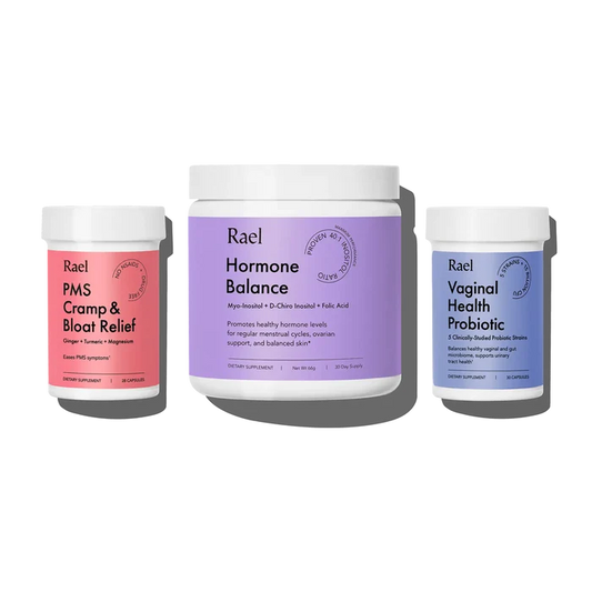 Three supplement jars labeled PMS Cramp & Bloat Relief, Hormone Balance, and Vaginal Health Probiotic by Rael.