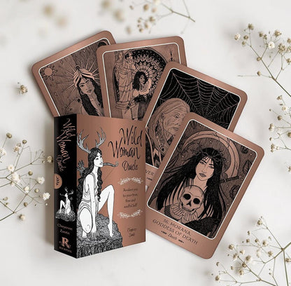 Wild Woman Oracle cards on a light background with decorative elements