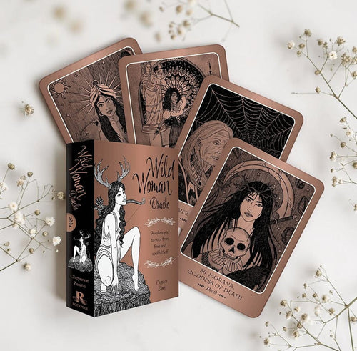 Wild Woman Oracle cards on a light background with decorative elements