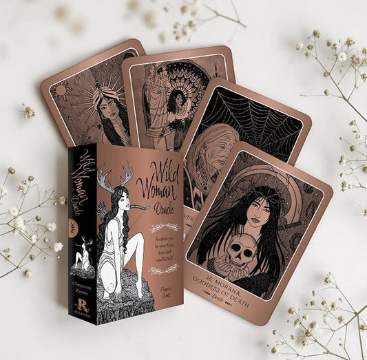 Wild Woman Oracle cards on a light background with decorative elements