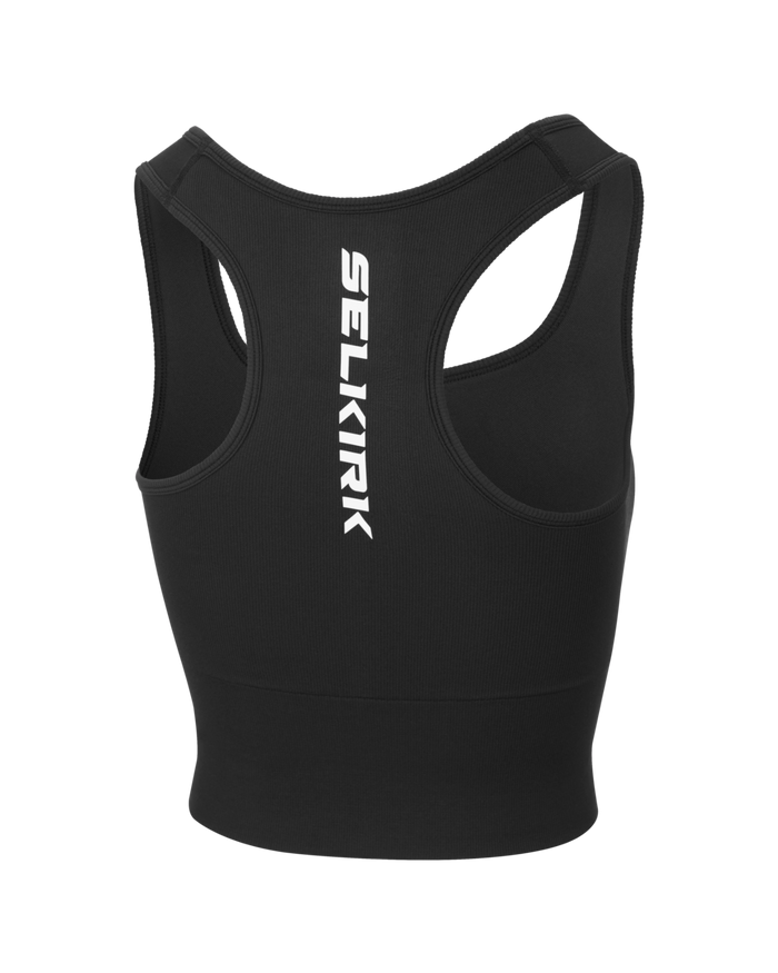 Black racerback crop top with vertical white SELKIRK logo centered on back