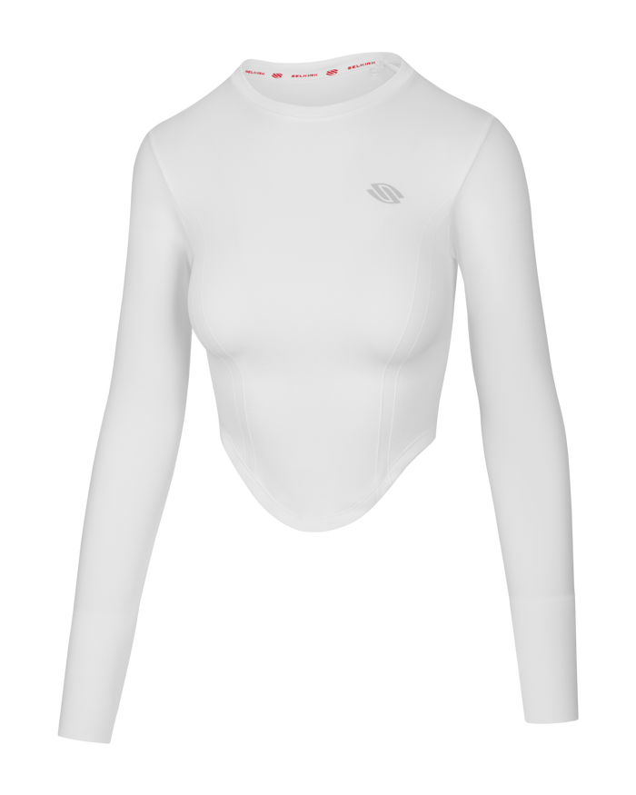 Women's white long-sleeve cropped athletic top with small Selkirk logo on chest and SELKIRK printed inside collar.